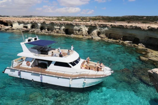 SCUBACAT catamaran cruising past the Ayia Napa Sea Caves on the way to Blue Lagoon