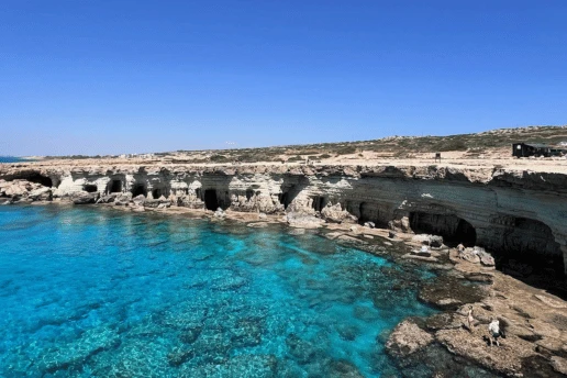 Limestone sea caves and turquoise water along the Cape Greco coast near Ayia Napa, Cyprus