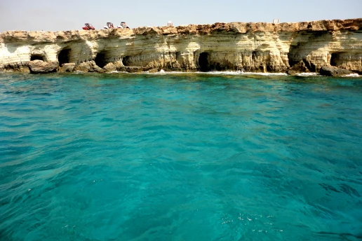 View over the Ayia Napa Sea Caves coastline and turquoise water from the cliff viewpoint