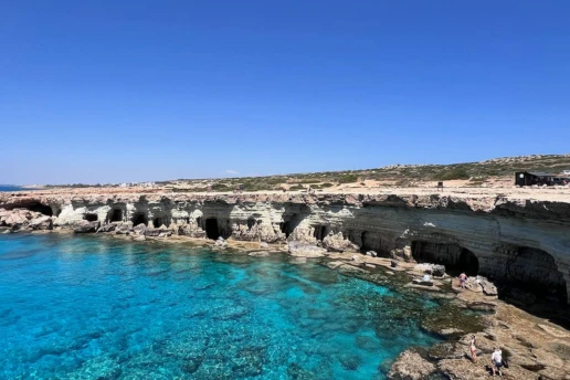 The Ayia Napa Sea Caves cliffs seen from the water on the coastline route to Cape Greco