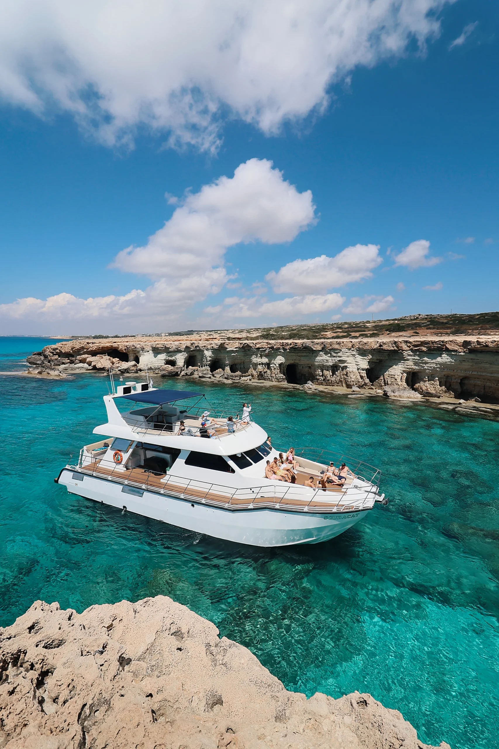 SCUBACAT catamaran anchored by the Sea Caves on a Blue Lagoon cruise from Ayia Napa