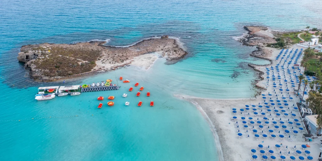 White sand and turquoise water at Nissi Beach, one of Ayia Napa's must-see spots, Cyprus